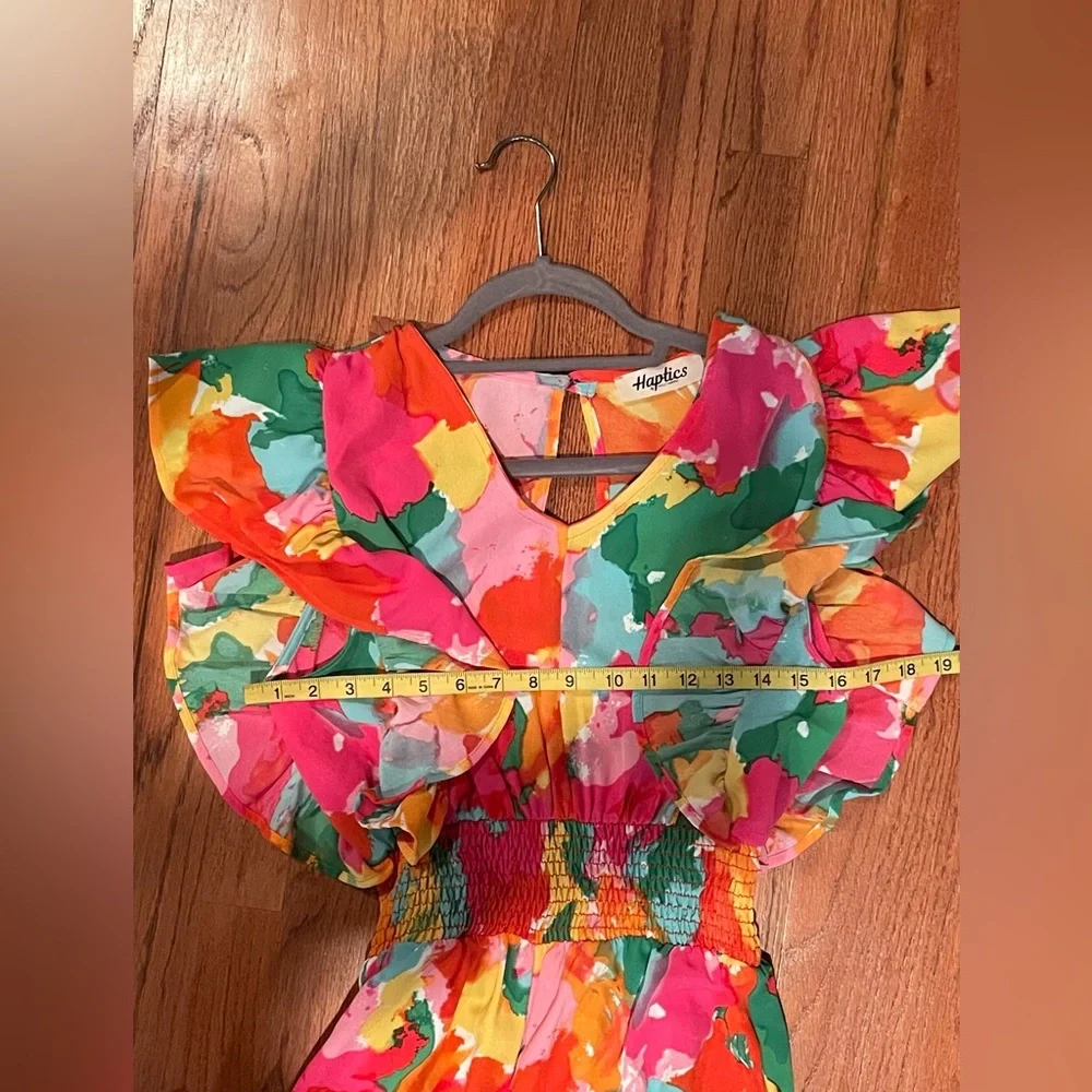 NWOT Floral Flutter Sleeve Romper. Size Small. - Picture 8 of 9